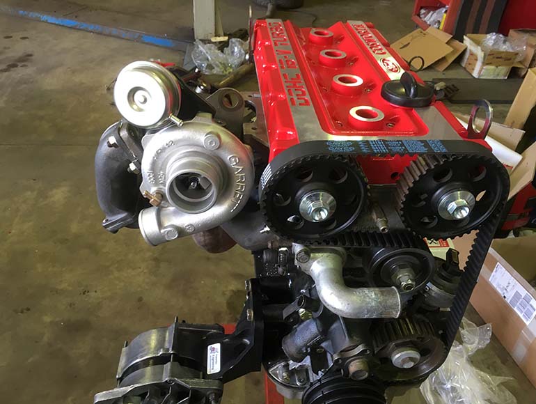 Engine with the cam cover removed during cambelt replacement